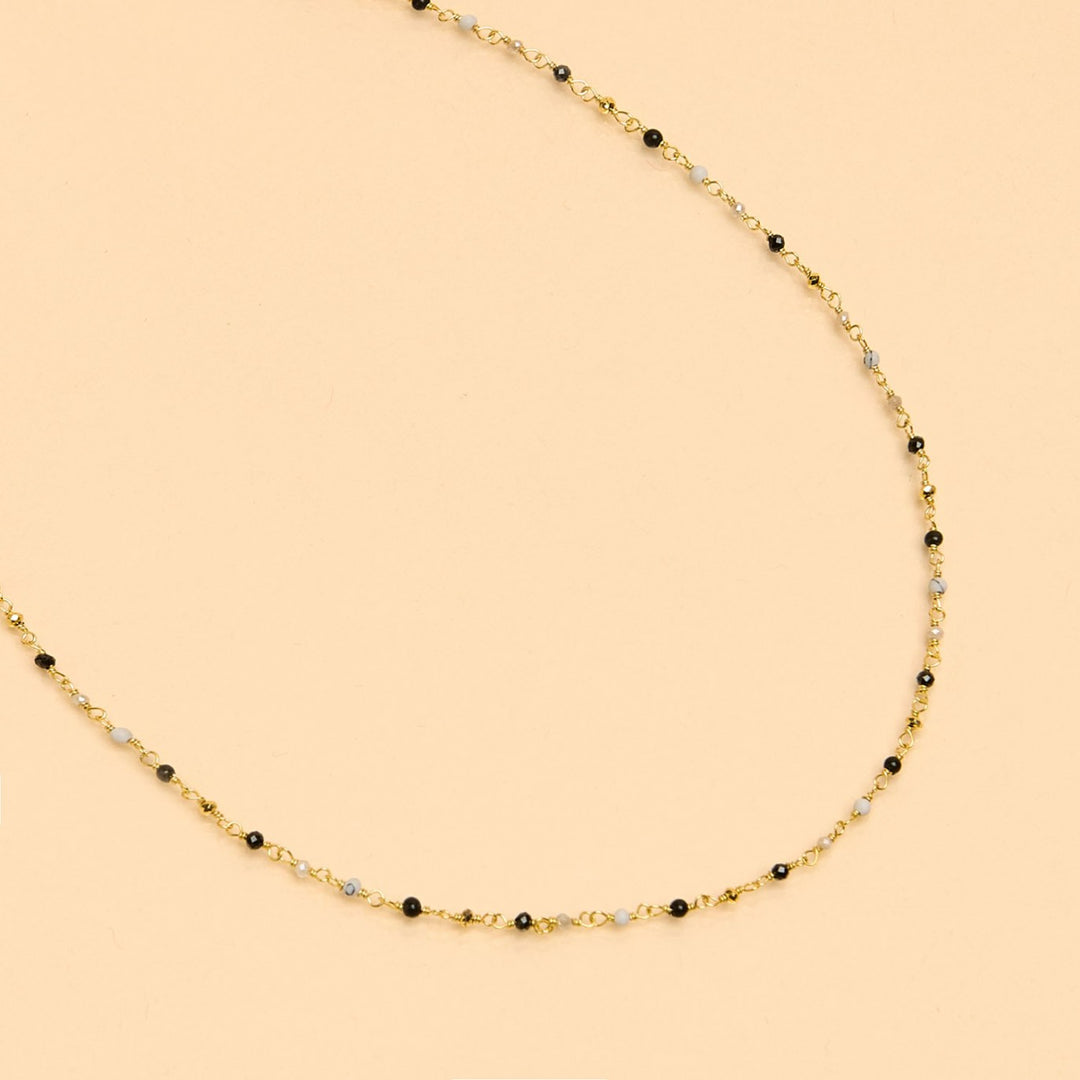 une a une ketting inde gradient gris